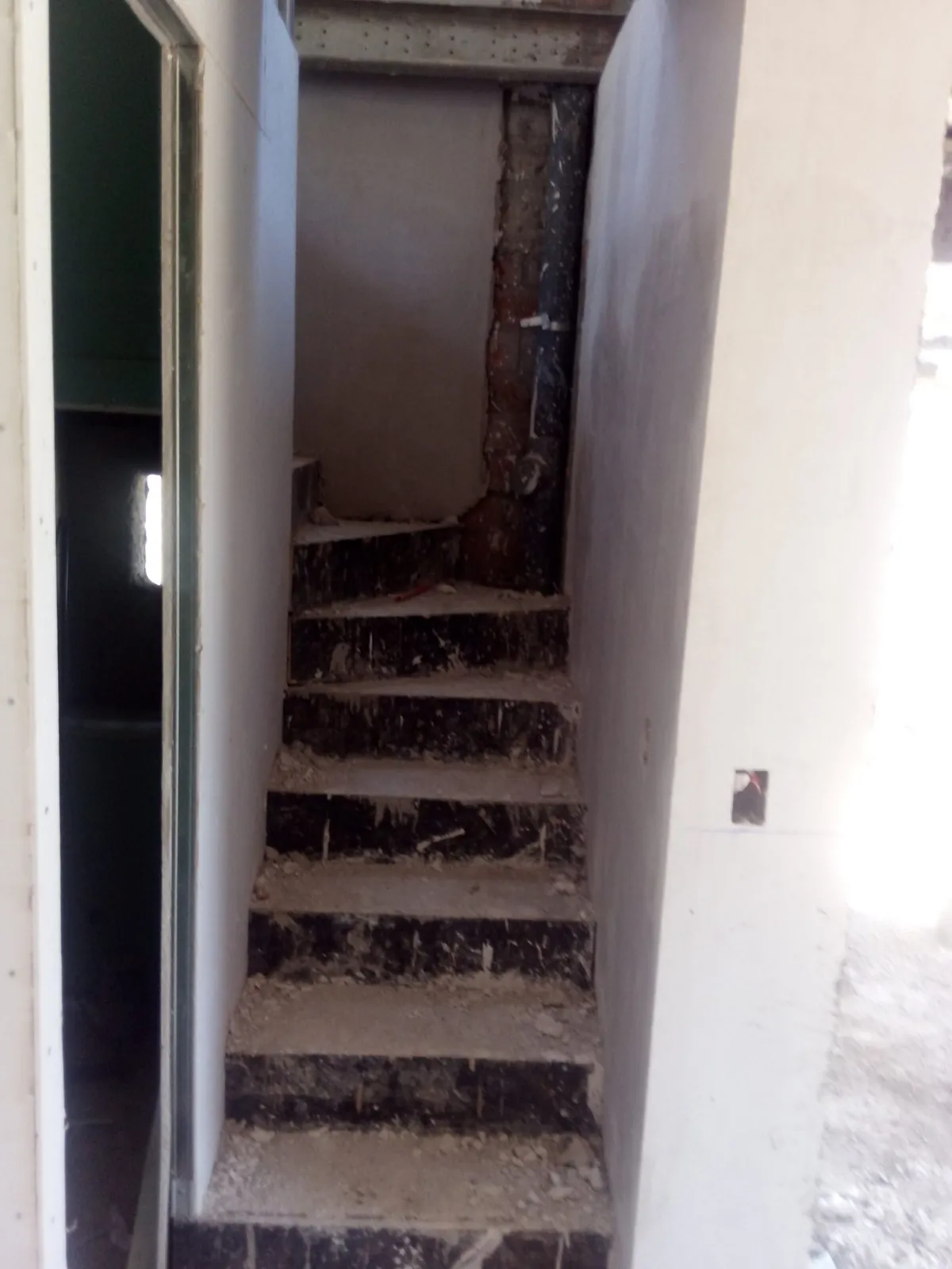 Revestimiento de escalera caracol en proyecto particular — foto 2